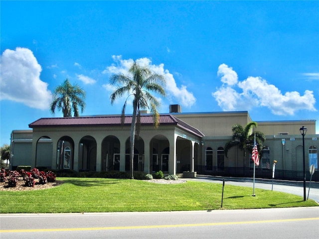 view of building exterior with driveway