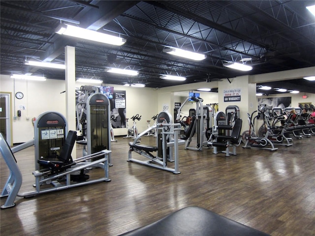 gym with wood finished floors