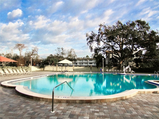 pool featuring a patio area