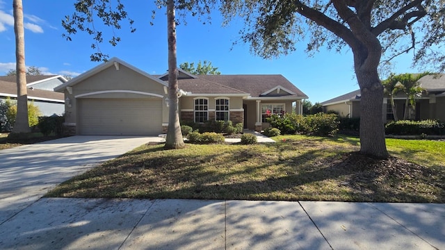 ranch-style house with a front lawn, driveway, an attached garage, and stucco siding