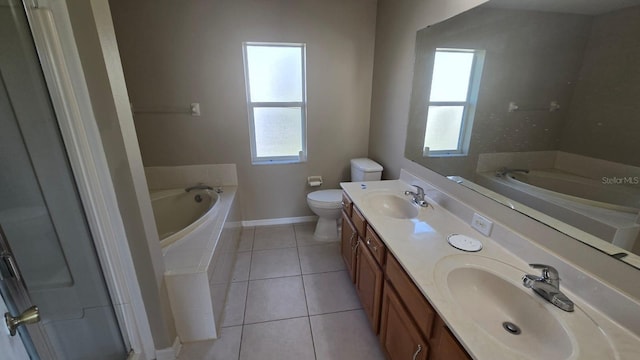 bathroom featuring tile patterned flooring, a healthy amount of sunlight, and a sink