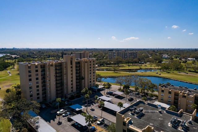 bird's eye view featuring a water view and a city view