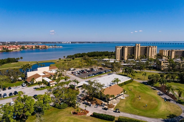 drone / aerial view with a water view and a city view