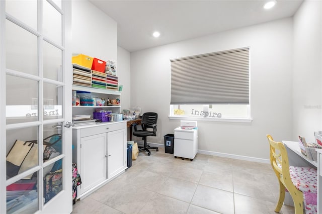 office space featuring recessed lighting, baseboards, and light tile patterned floors