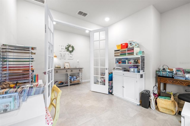 interior space featuring french doors, visible vents, and recessed lighting