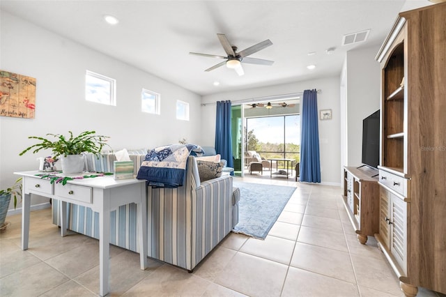 living room with recessed lighting, visible vents, light tile patterned flooring, ceiling fan, and baseboards