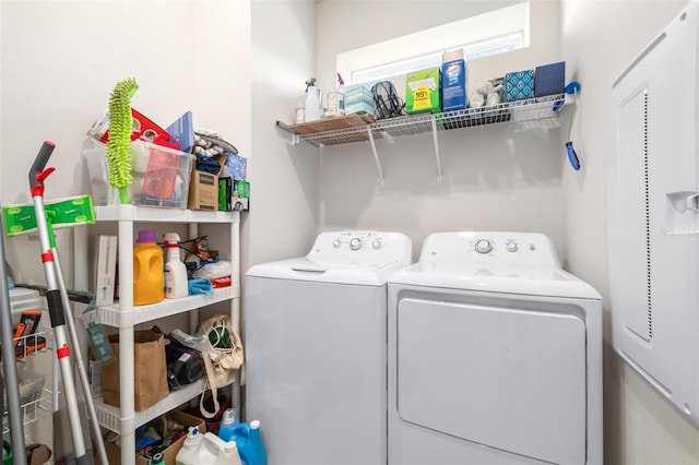 laundry area with laundry area and independent washer and dryer