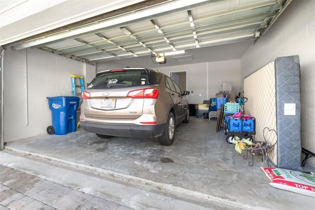 garage featuring a garage door opener