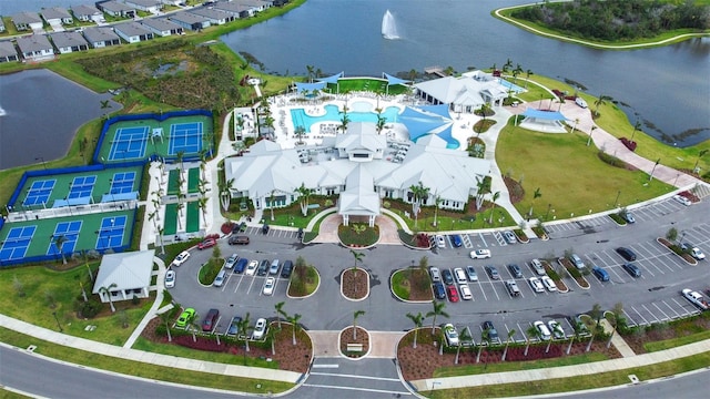 bird's eye view featuring a water view and a residential view