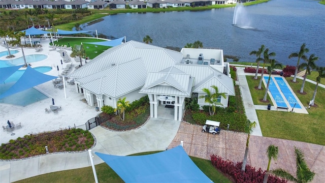 aerial view featuring a residential view and a water view