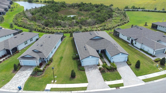 aerial view with a water view and a residential view