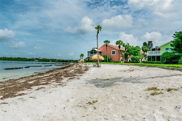 exterior space with a water view