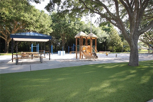 community jungle gym featuring a yard and a gazebo