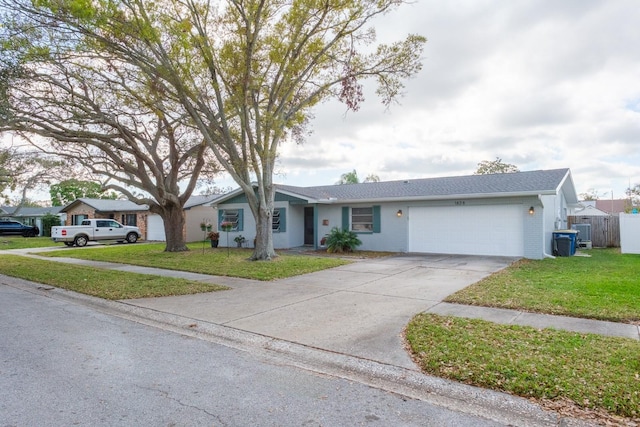 ranch-style house featuring brick siding, an attached garage, driveway, and a front lawn