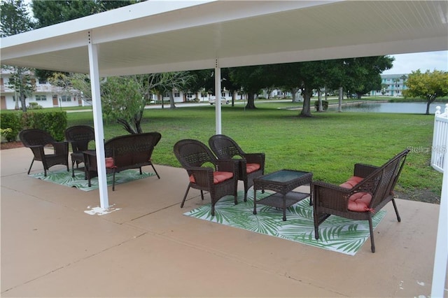 view of patio featuring a water view