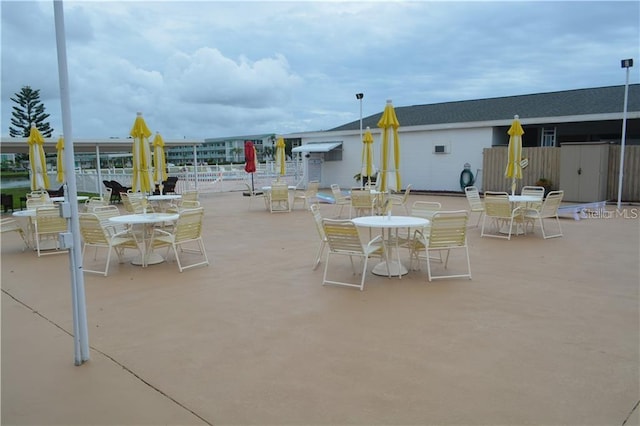 view of patio featuring outdoor dining area