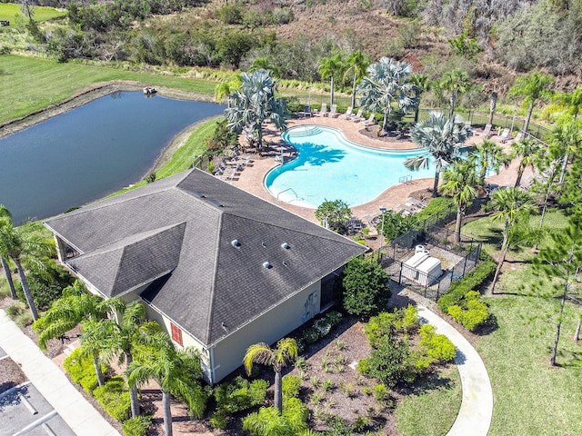 bird's eye view with a water view