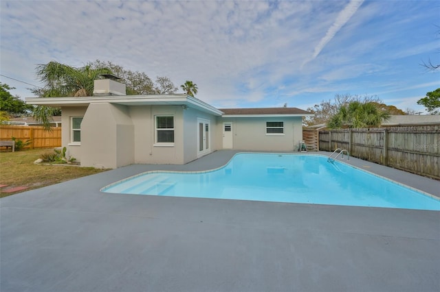 view of pool with a fenced in pool, a patio area, and a fenced backyard