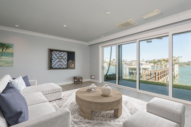 living room featuring recessed lighting, crown molding, a water view, baseboards, and finished concrete floors