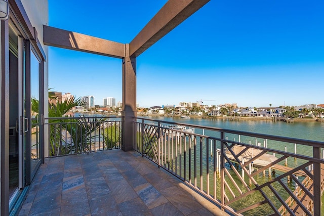 balcony featuring a water view