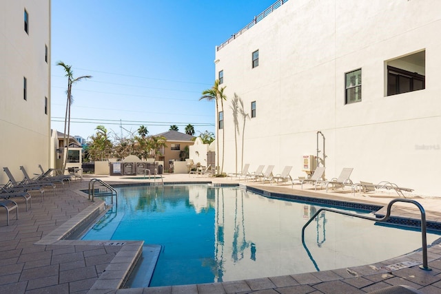 community pool with a patio