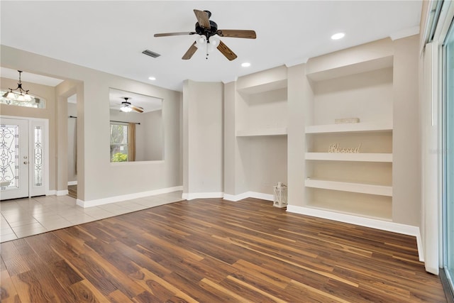 foyer entrance featuring a ceiling fan, recessed lighting, wood finished floors, and visible vents