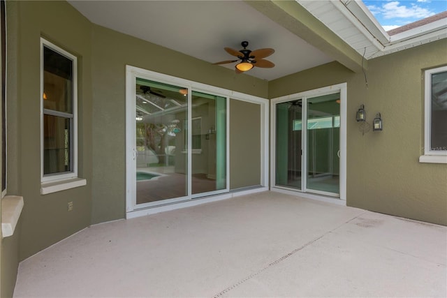 view of patio with ceiling fan