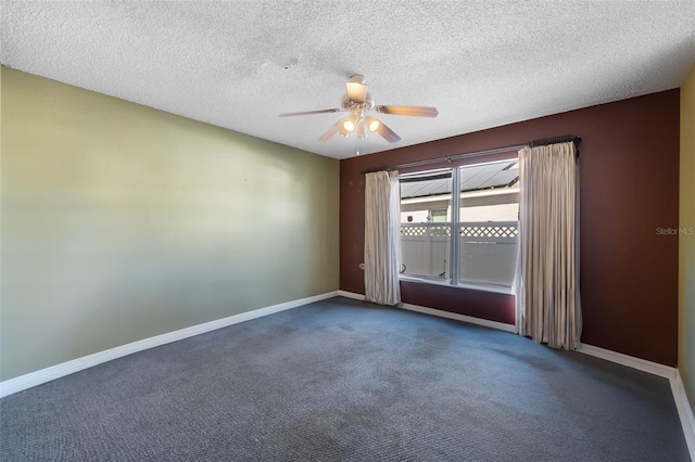 carpeted empty room with a textured ceiling, ceiling fan, and baseboards