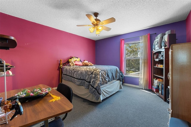 carpeted bedroom with a textured ceiling and a ceiling fan