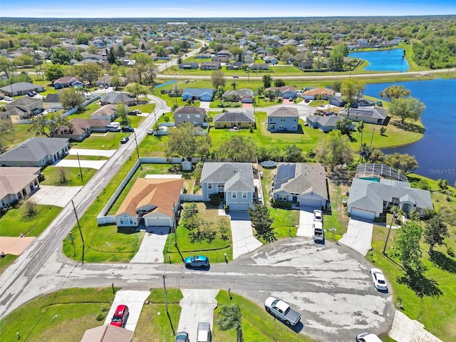 aerial view featuring a water view and a residential view