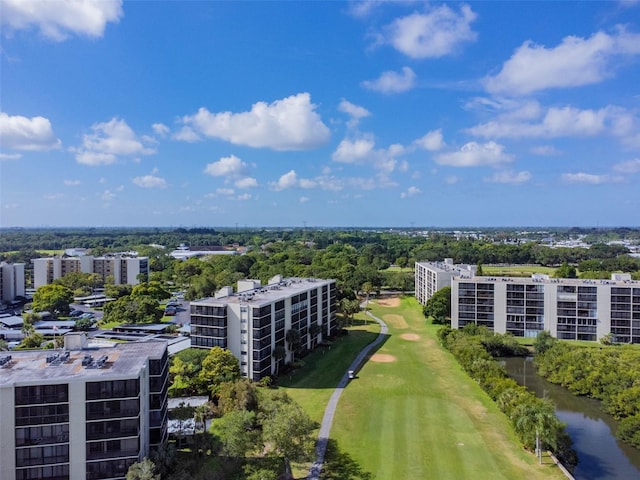 bird's eye view featuring a view of city and a water view