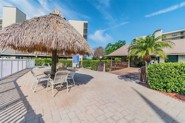 view of patio featuring fence