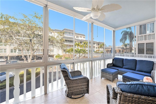 sunroom / solarium with ceiling fan