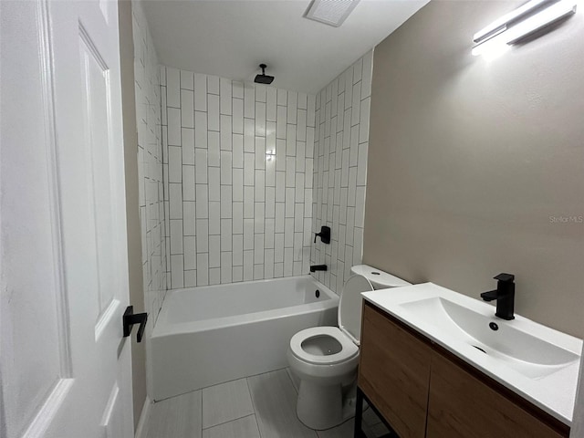 bathroom with visible vents, bathing tub / shower combination, toilet, tile patterned floors, and vanity