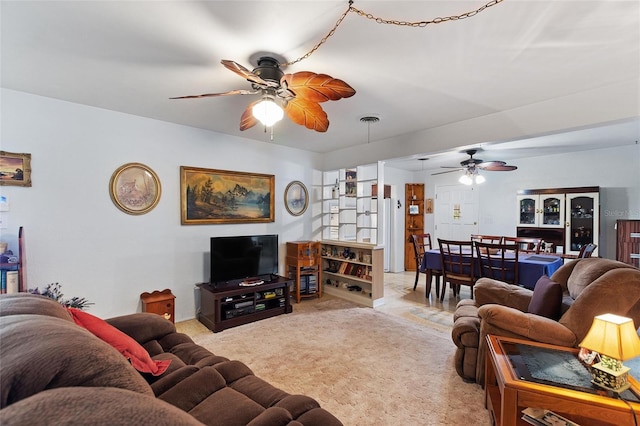 4310 Indian Lake Dr, Indian Lake Estates, FL 33855 - living room with light colored carpet, ceiling fan, and visible vents