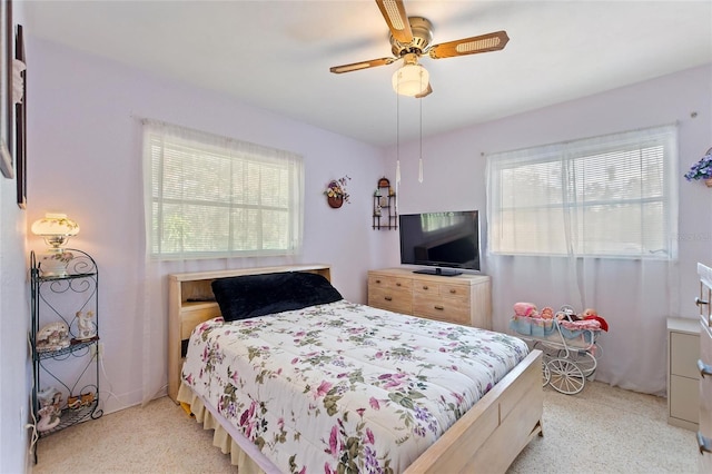 4310 Indian Lake Dr, Indian Lake Estates, FL 33855 - bedroom featuring a ceiling fan and multiple windows