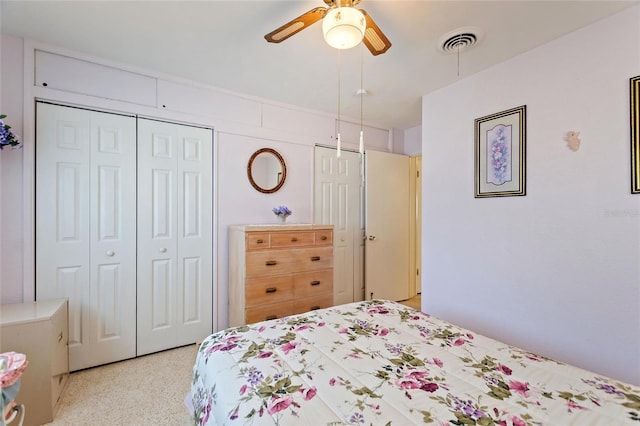 4310 Indian Lake Dr, Indian Lake Estates, FL 33855 - bedroom featuring visible vents, ceiling fan, and two closets