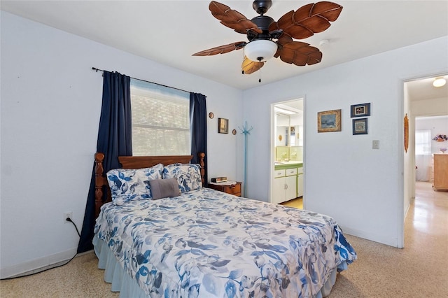 4310 Indian Lake Dr, Indian Lake Estates, FL 33855 - bedroom featuring a ceiling fan, baseboards, ensuite bath, and light speckled floor