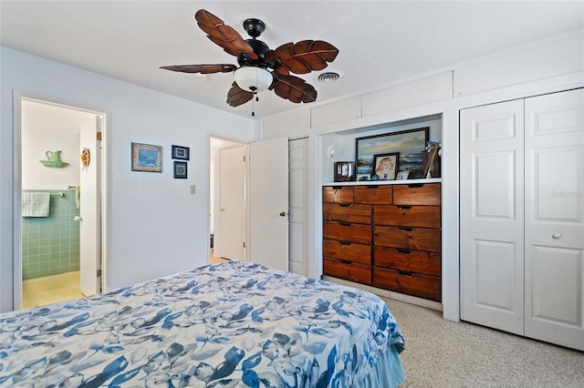 4310 Indian Lake Dr, Indian Lake Estates, FL 33855 - bedroom with ensuite bathroom, light speckled floor, visible vents, and a ceiling fan