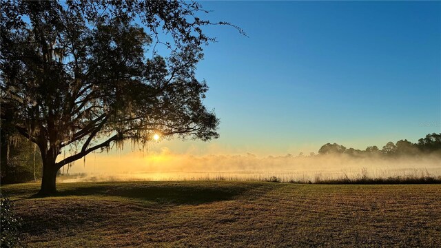 4310 Indian Lake Dr, Indian Lake Estates, FL 33855 - nature at dusk featuring a water view