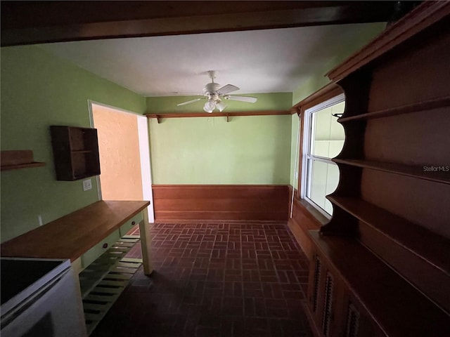 interior space featuring brick patterned floor