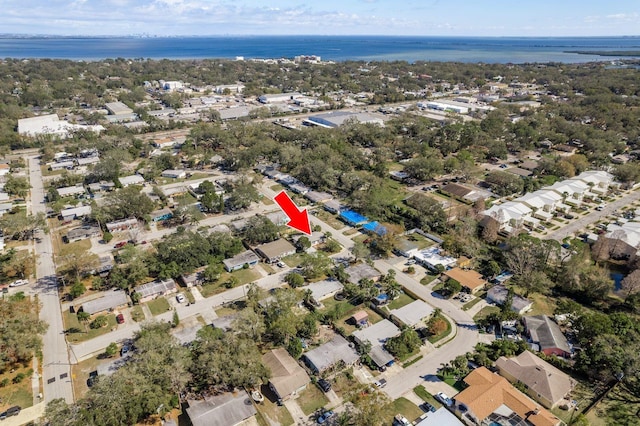 bird's eye view with a water view and a residential view