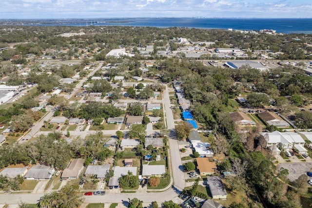 bird's eye view featuring a residential view and a water view