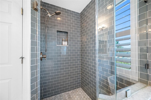 full bath featuring a shower stall