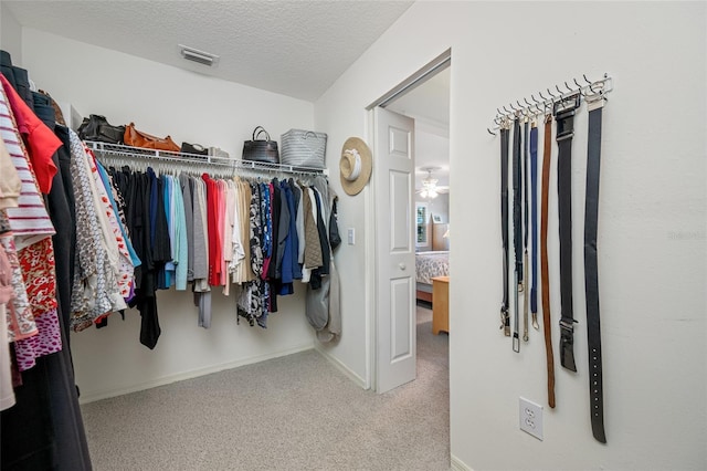 walk in closet with carpet and visible vents