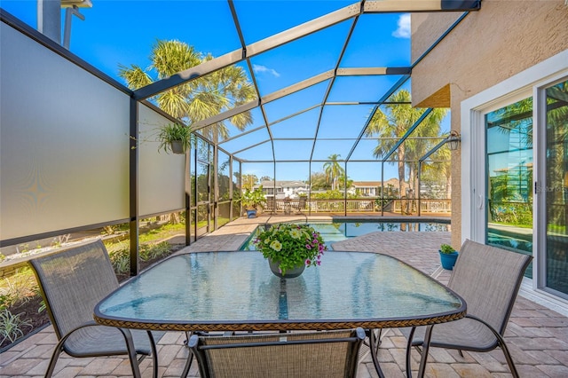 sunroom / solarium featuring a healthy amount of sunlight