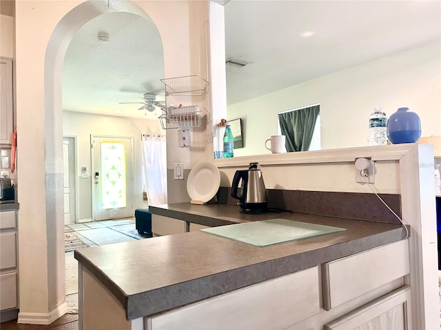 bathroom with visible vents and ceiling fan