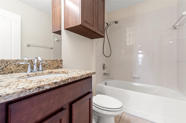 full bath with tile patterned flooring, shower / bathing tub combination, vanity, and toilet