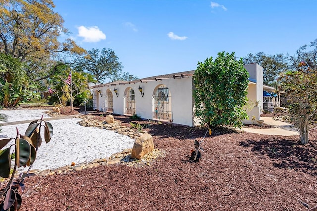 exterior space with stucco siding