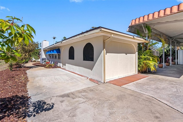 exterior space featuring stucco siding